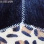 626 COWHIDE HAIR-ON LEATHER PATCHWORK RUG 48IN DIA