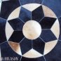 627 COWHIDE HAIR-ON LEATHER PATCHWORK RUG 48IN DIA
