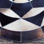 627 COWHIDE HAIR-ON LEATHER PATCHWORK RUG 48IN DIA