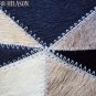 627 COWHIDE HAIR-ON LEATHER PATCHWORK RUG 48IN DIA