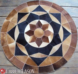 628 COWHIDE HAIR-ON LEATHER PATCHWORK RUG 48IN DIA