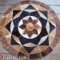 628 COWHIDE HAIR-ON LEATHER PATCHWORK RUG 48IN DIA