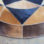 628 COWHIDE HAIR-ON LEATHER PATCHWORK RUG 48IN DIA