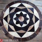 629 COWHIDE HAIR-ON LEATHER PATCHWORK RUG 48IN DIA