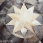 633 COWHIDE HAIR-ON LEATHER PATCHWORK RUG 48IN DIA