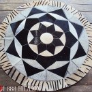 654 COWHIDE HAIR-ON LEATHER PATCHWORK RUG 48IN DIA