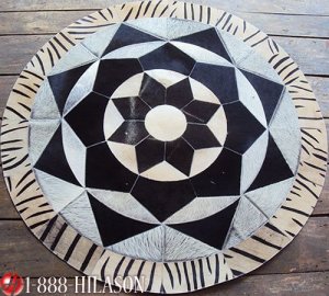 654 COWHIDE HAIR-ON LEATHER PATCHWORK RUG 48IN DIA