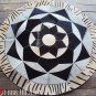 654 COWHIDE HAIR-ON LEATHER PATCHWORK RUG 48IN DIA
