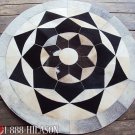 655 COWHIDE HAIR-ON LEATHER PATCHWORK RUG 48IN DIA