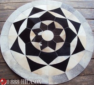 655 COWHIDE HAIR-ON LEATHER PATCHWORK RUG 48IN DIA