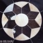 655 COWHIDE HAIR-ON LEATHER PATCHWORK RUG 48IN DIA