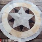 657 COWHIDE HAIR-ON LEATHER PATCHWORK RUG 48IN DIA