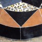 635 COWHIDE HAIR-ON LEATHER PATCHWORK RUG 48IN DIA