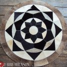 637 COWHIDE HAIR-ON LEATHER PATCHWORK RUG 48IN DIA