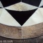 637 COWHIDE HAIR-ON LEATHER PATCHWORK RUG 48IN DIA