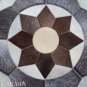 638 COWHIDE HAIR-ON LEATHER PATCHWORK RUG 48IN DIA