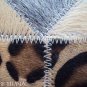 638 COWHIDE HAIR-ON LEATHER PATCHWORK RUG 48IN DIA