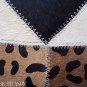 642 COWHIDE HAIR-ON LEATHER PATCHWORK RUG 48IN DIA