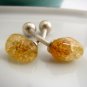 Stone cufflinks set on sterling silver stems