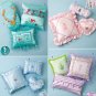 Simplicity 2385 Decorative pillows in seven sizes shown with Disney trim.