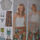 Simplicity 4598 Misses cropped pants, poncho, woven swimsuit, bag, knit top 14-20