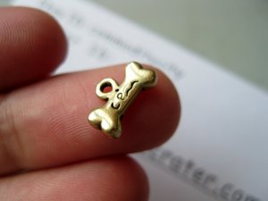 Lot of 50pcs mini Gold Bone dollhouse miniature toy/jewelry Charm