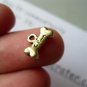 Lot of 50pcs mini Gold Bone dollhouse miniature toy/jewelry Charm