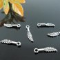 Lot of 100pcs mini Feather dollhouse miniature toy/jewelry bracelet  metal alloy Charm B2