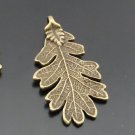 Lot of 100pcs Cutout Leaf dollhouse miniature toy/jewelry bracelet  metal alloy Charm CM701