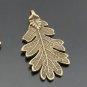 Lot of 100pcs Cutout Leaf dollhouse miniature toy/jewelry bracelet  metal alloy Charm CM701
