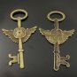 Lot of 100pcs mini brass clock wing Key dollhouse miniature toy/jewelry Charm CM1010
