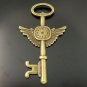 Lot of 100pcs mini brass clock wing Key dollhouse miniature toy/jewelry Charm CM1010