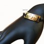 Gold plate ALAD on black cord bracelet