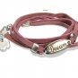 Silver charm on leather wrap bracelet