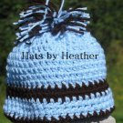 Brown/blue pom pom hat
