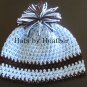 Brown/blue pom pom hat