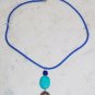 Artisan Turquoise drop pendant with blue braided neck cord