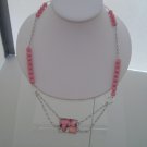 Item number 028: Pink cat eye necklace