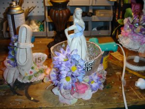 Lady in a cup centerpiece