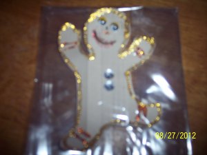 Beige googly eyed gingerbread man