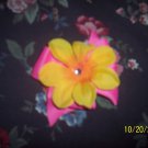 pink bow with beautiful yellow flower