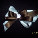 brown and white silk bowtie