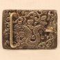 Tibetan Buddhist repousse silver and turquoise buckle