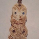 Vintage carved Bone Maori Tiki on waxed cord