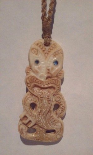 Vintage carved Bone Maori Tiki on waxed cord