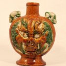 Antique Chinese Tang Dynasty style sancai glazed flask with rabbits