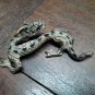 Chinese cast pewter and gilt dragon Scholars paper weight