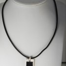 KENNETH COLE REACTION DESIGNER DOG TAG STYLE PENDANT ON LEATHER CORD NECKLACE