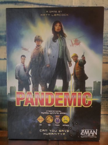 PANDEMIC -  The Board Gamre Z-Man Games.......(opened)