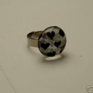 MAGNIFIED GLASS BLACK HEART SILVERTONE ADJUSTABLE RING